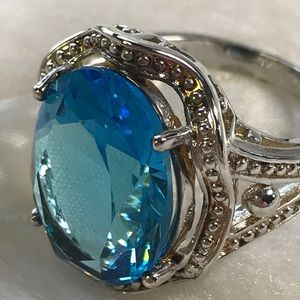 Exquisite Sterling Silver with Beautiful Blue Ston